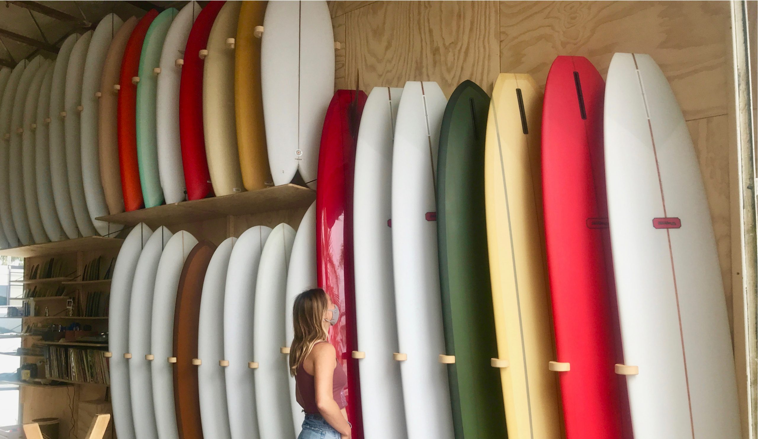 girl in surf shop