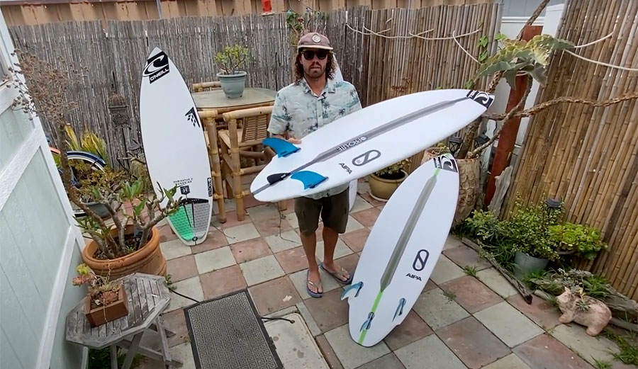 Timmy Reyes with Flat Earth Surfboard