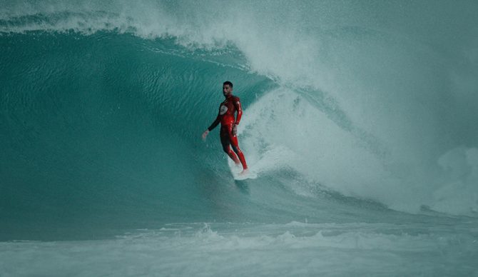 Filipe Toledo rides a barrel