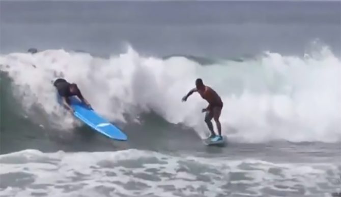 a dude gets slammed in the surf