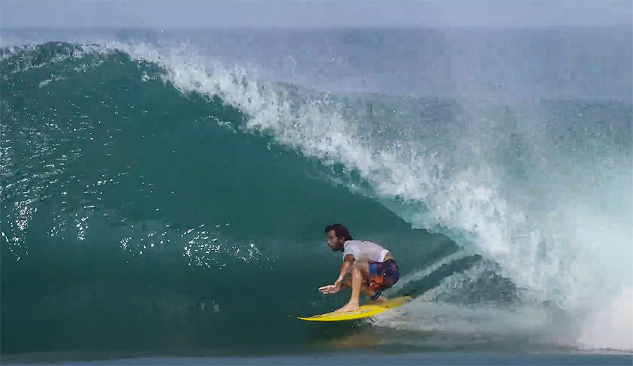 Mason Ho surfing a point break in Mexico