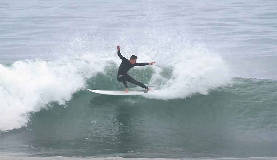 Kevin Schulz surfing mid-length surfboard