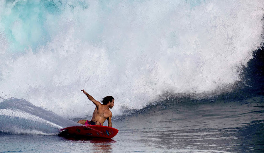 Mason Ho surfing
