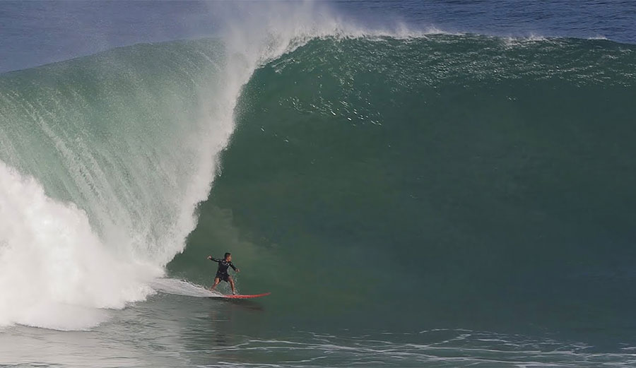 Uluwatu surfer on big wave
