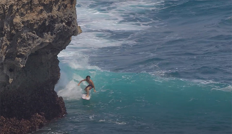 Mason Ho surfs the cliff at Uluwatu