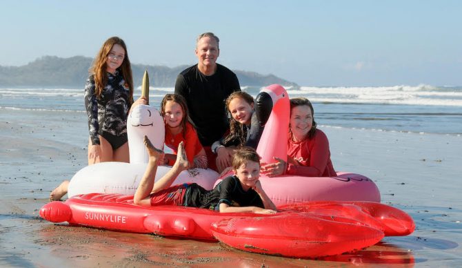 Kathy Thomas with her family on the beach for Salt + Snow