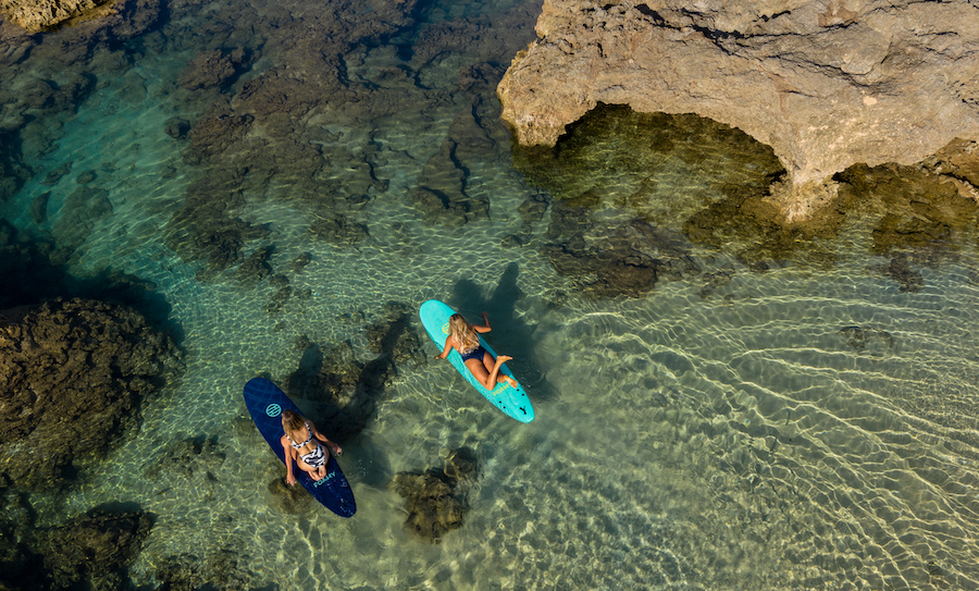 8' foamy gunner overhead paddle shot
