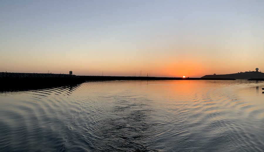 sunset over pillar point harbor