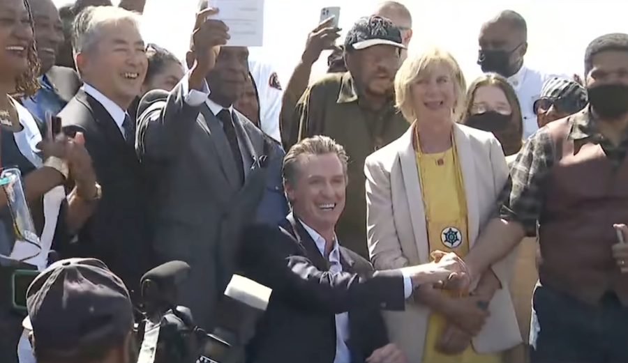 gavin newsom shaking anthony bruce's hand