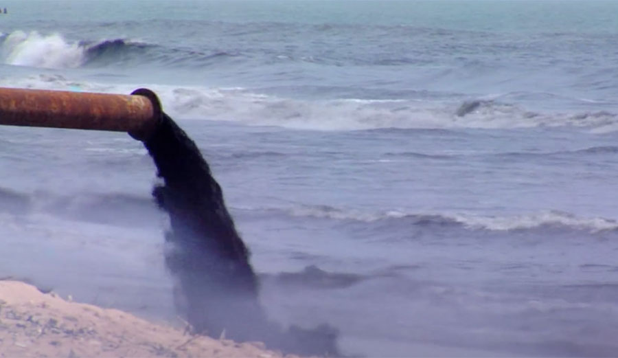 human excrement pouring into sea