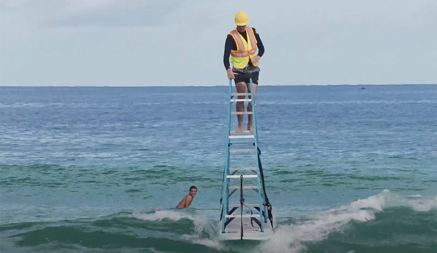 Jamie O'Brien ladder surfing