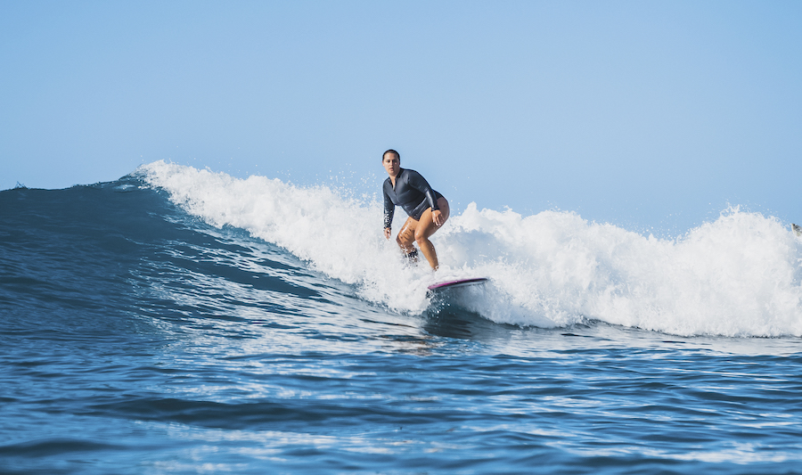 Curvy Surfer Girl Surfing