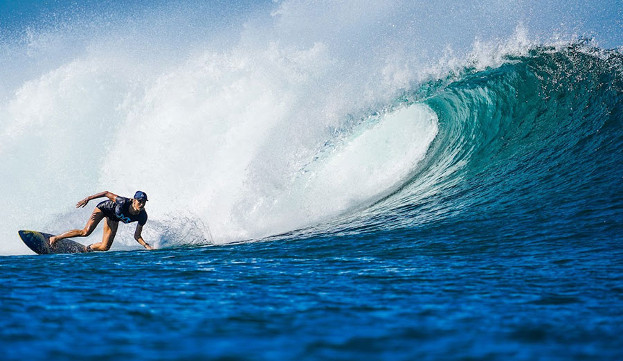 Holly Beck surfing