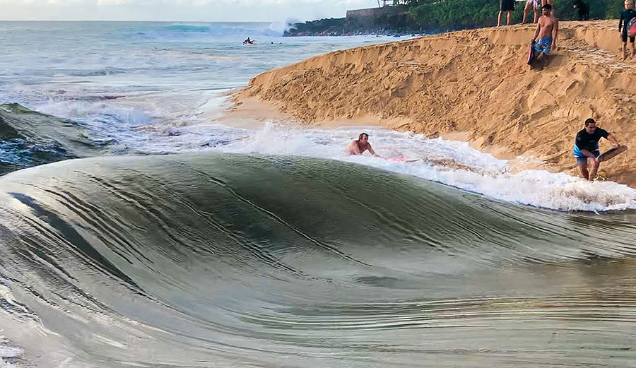 Jamie O'Brien surfing Waimea River