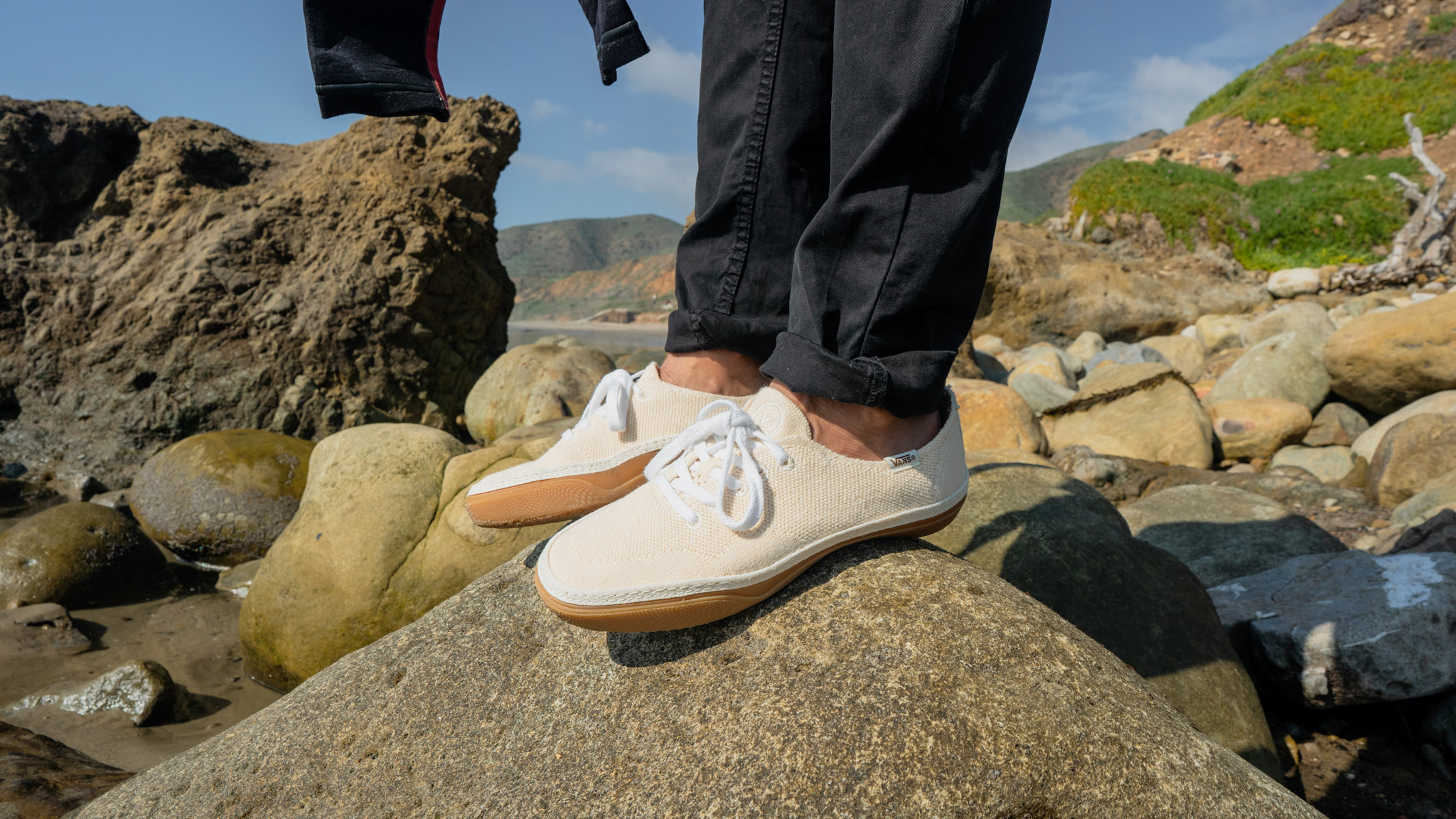 Vans Circle Vee Shoes on rocks on the beach