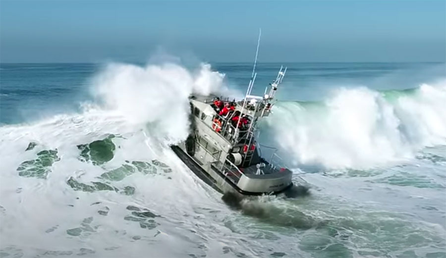 Drone Footage of Coast Guard Boat Charging Through Ocean Beach Surf Is Oddly Satisfying