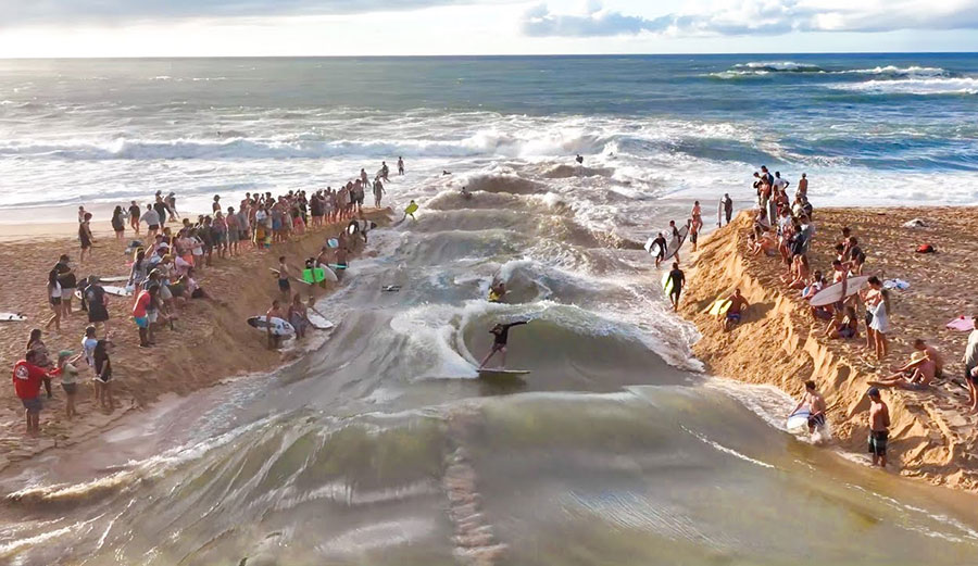 Jamie O'Brien surfing Waimea River