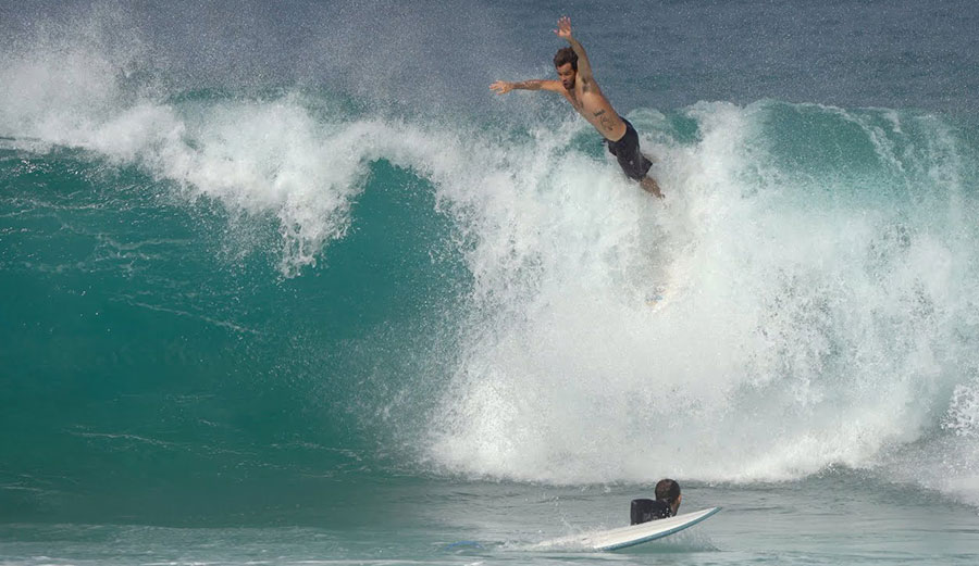 Mason Ho surfing