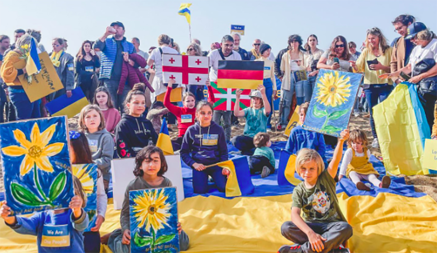 Surfers Come Together in Biarritz During 'Walk for Peace' to Protest Russian Invasion of Ukraine
