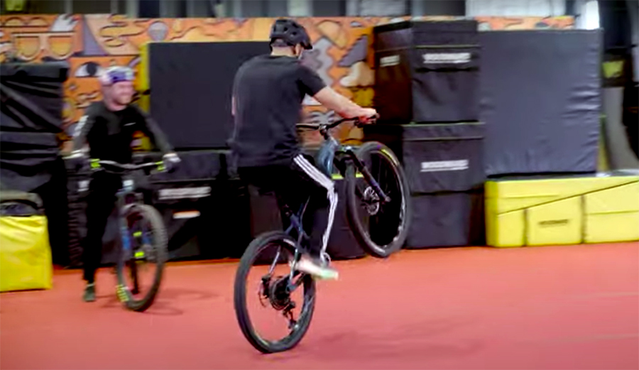 Danny MacAskill Teaches NFL Running Back Austin Ekeler How to Ride a Wheelie