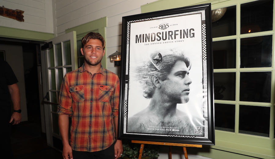 Conner Coffin poses with a poster for 'Mind Surfing'