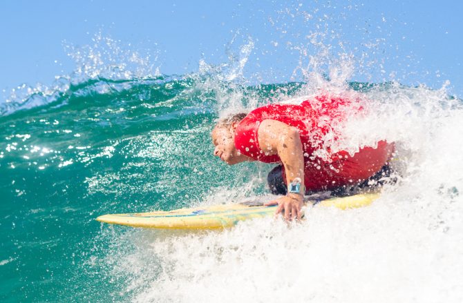 Head dip at the Hawai'i Adaptive Surf Championships with Waiakea and AccesSurf