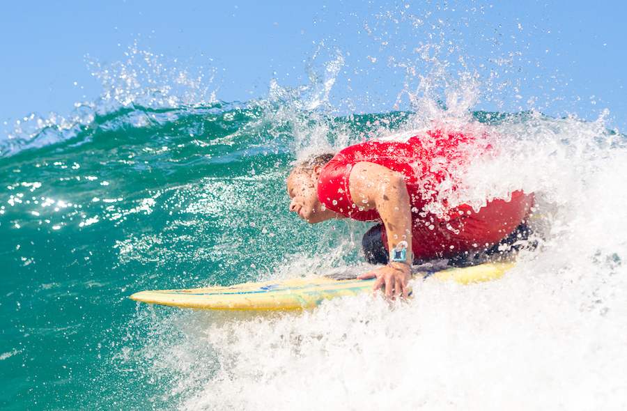 Head dip at the Hawai'i Adaptive Surf Championships with Waiakea and AccesSurf