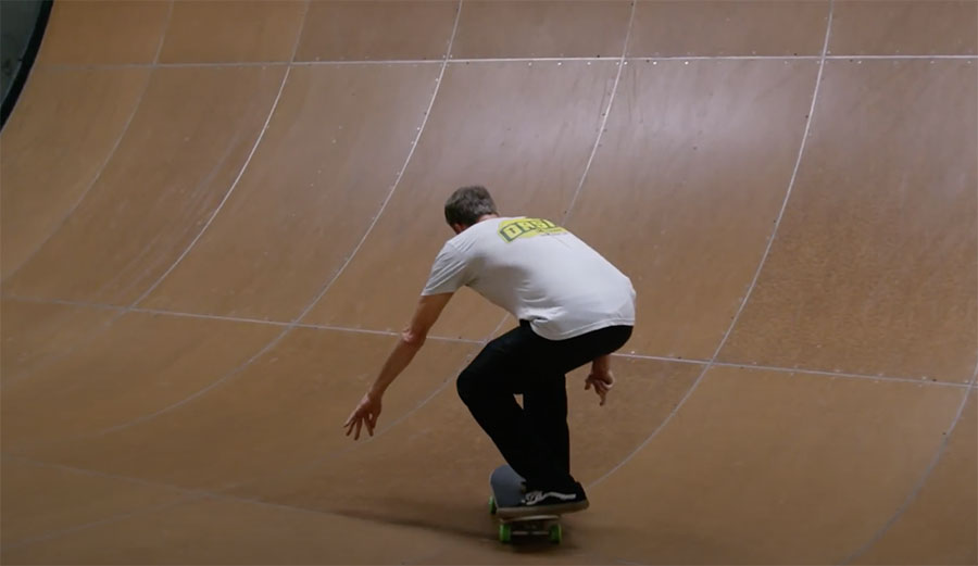 Tony Hawk doing a kick flip