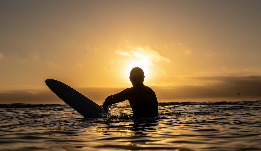Surfer at sunset