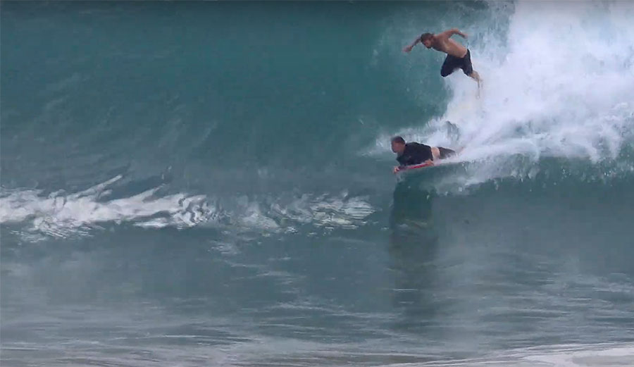 kirra surfing with surfer and bodyboarder