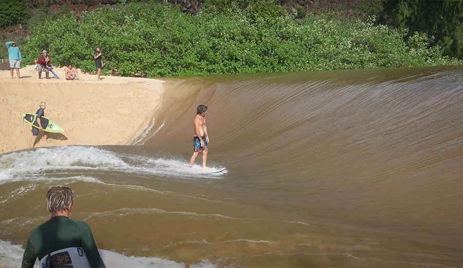 Mason Ho surfing Waimea River wave