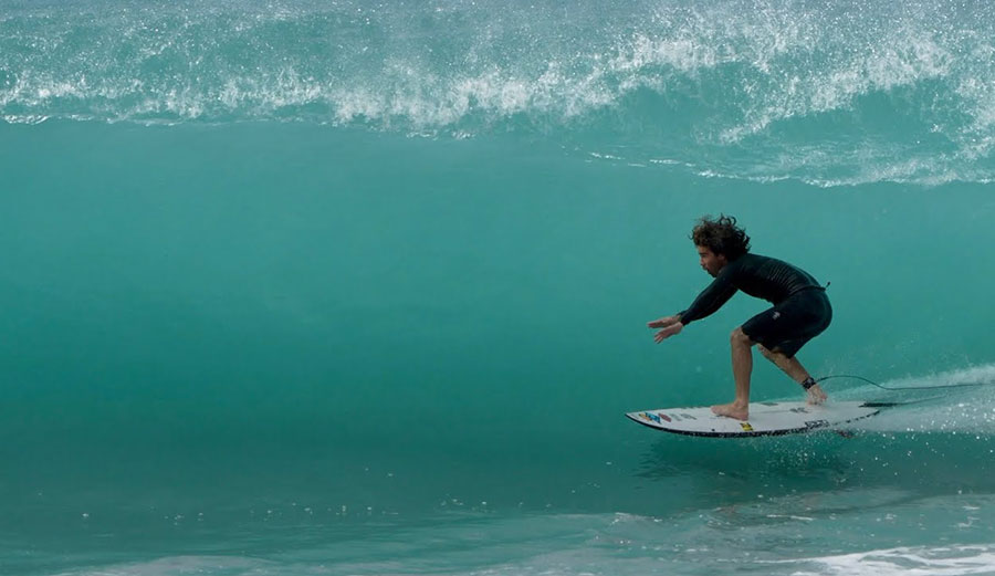Mason Ho surfing