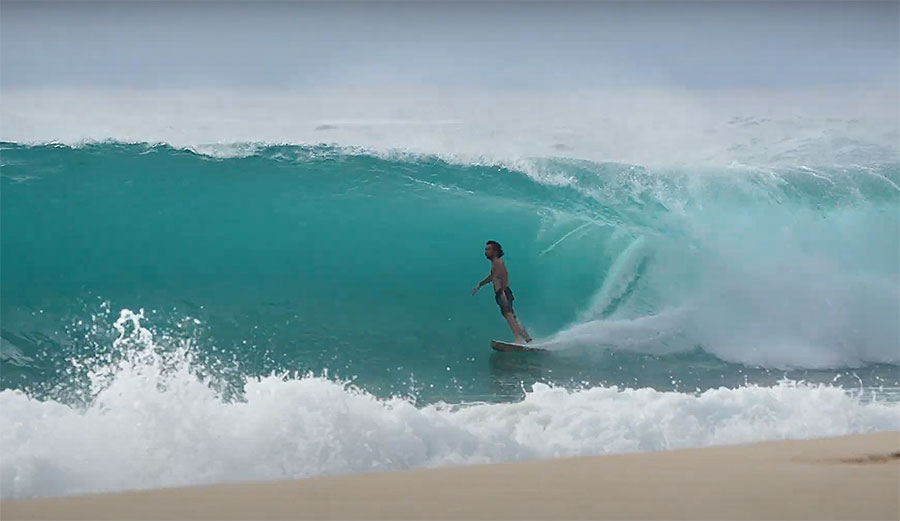 Mason Ho surfing in Hawaii