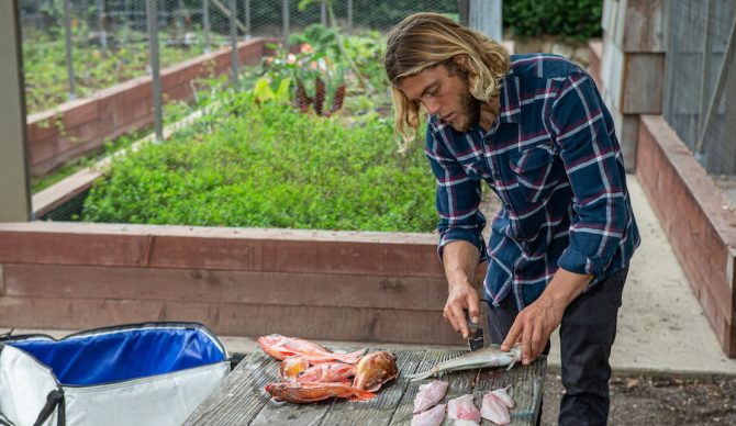 Conner Coffin cutting fish