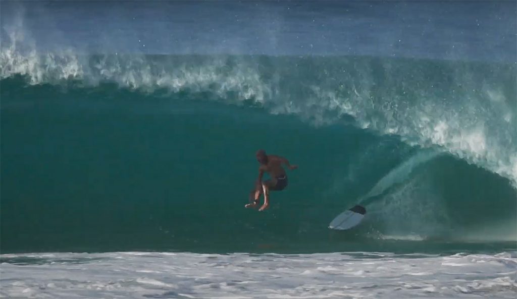 Kelly Slater surfing north shore tubes