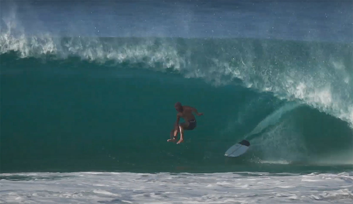 Kelly Slater surfing north shore tubes