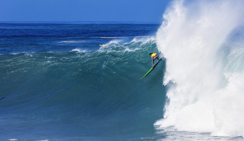 Some of surfing's best photographers are showing their work from the Eddie Aikau Invitational at an art exhibition in Honolulu's Chinatown.