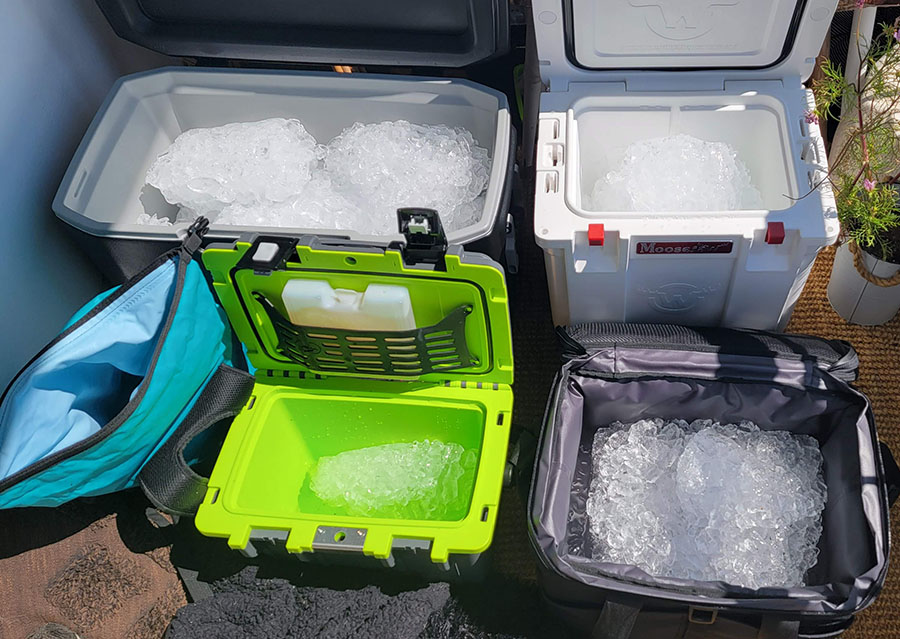Five different beach coolers filled with ice as we test out the ice retention for our review of the best beach coolers.