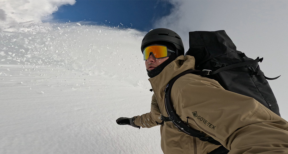 snowboarding in powder with smith pursuit backcountry glasses