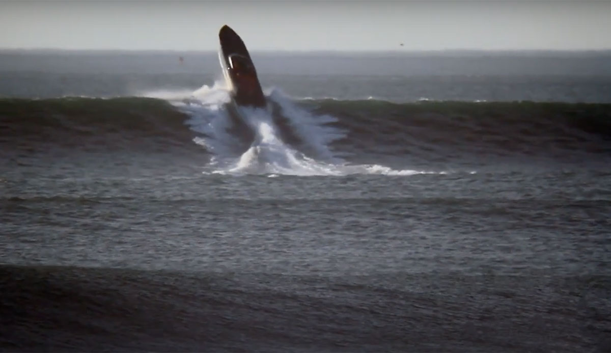 Cigarette Boat on wave at Ocean Beach