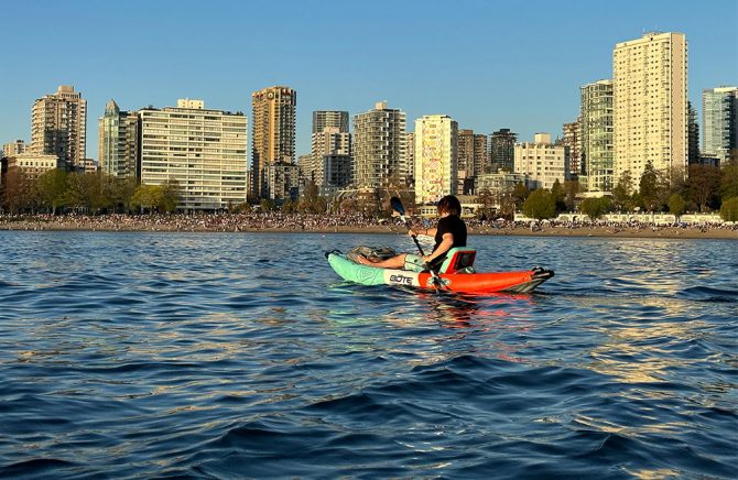 paddling the bote aero zeppelin in vancouver's english bay.