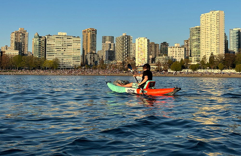 paddling the bote aero zeppelin in vancouver's english bay.