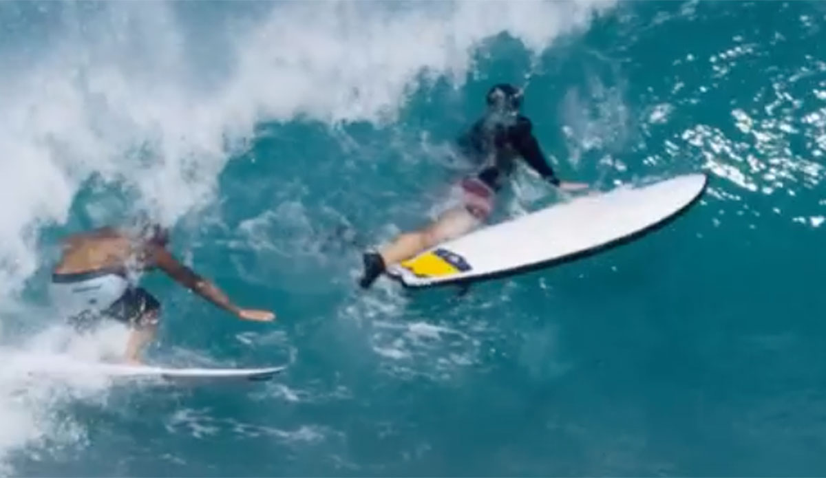 Italo Ferreira dodges surfboard