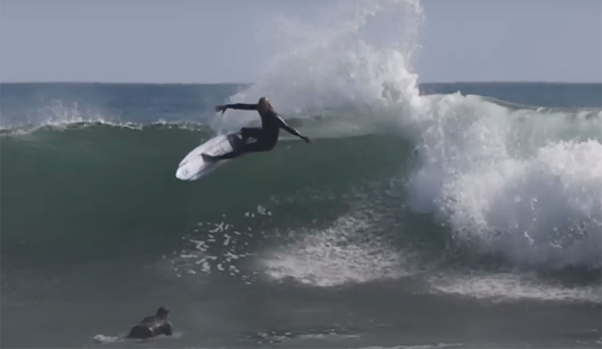 Kelly Slater surfing Lowers