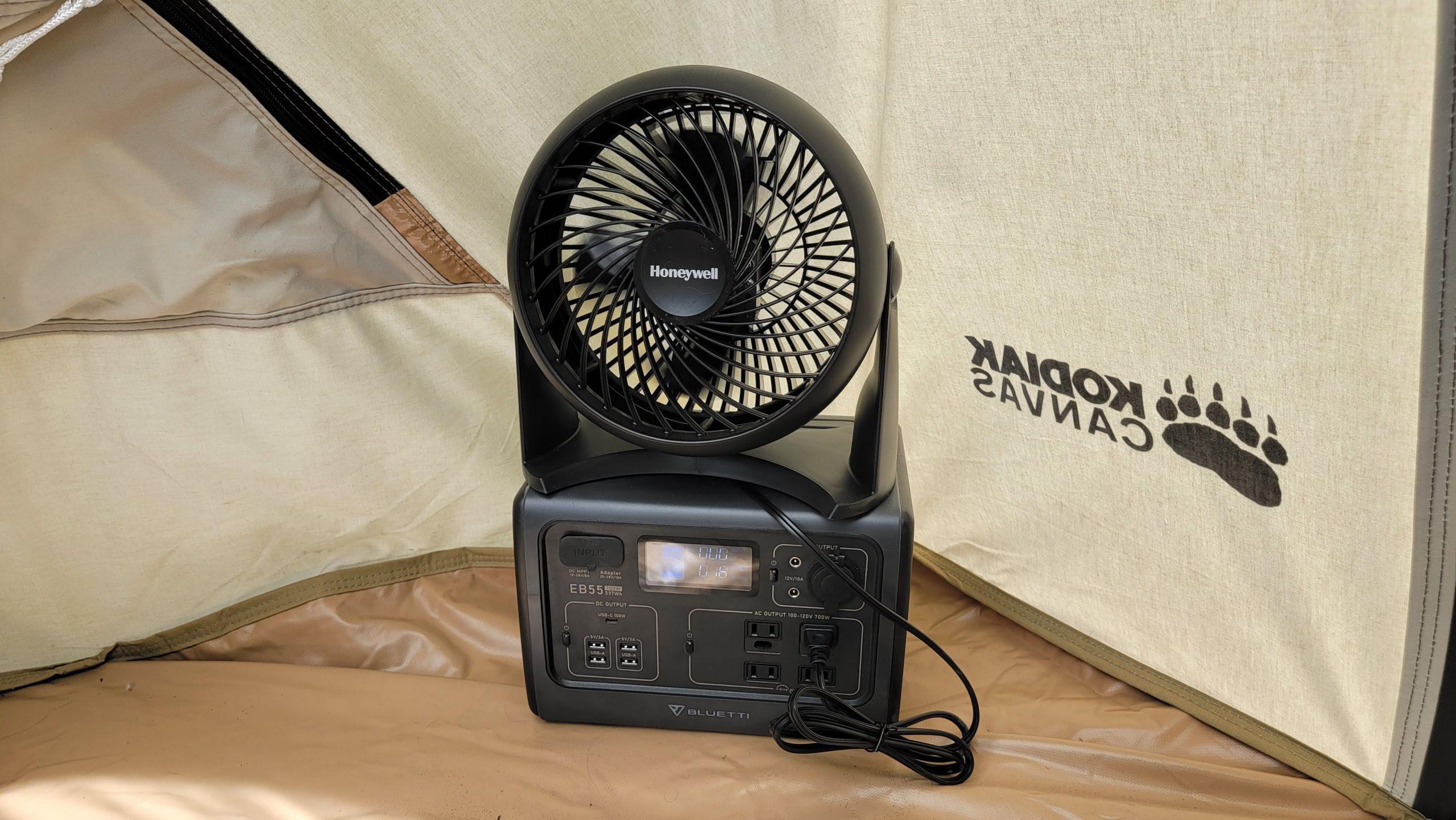 A fan inside a tent, powered by the bluetti eb55 portable power station during a gear test.