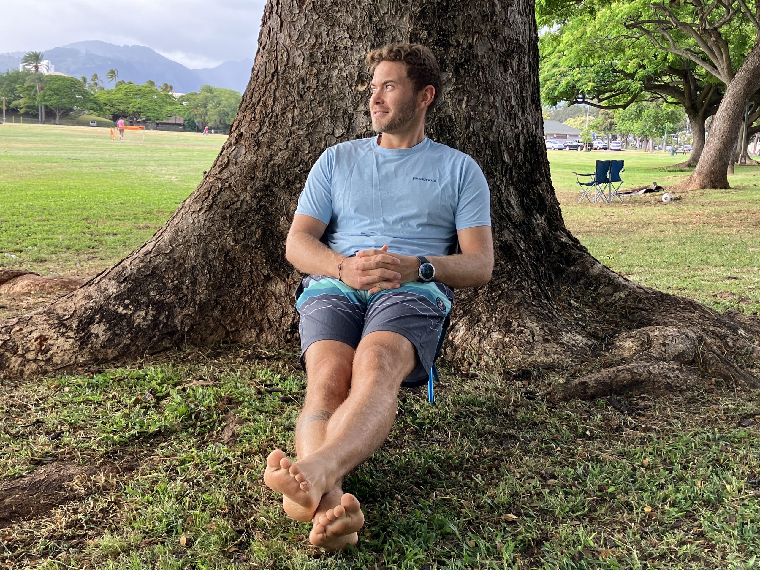 sitting in a camping chair