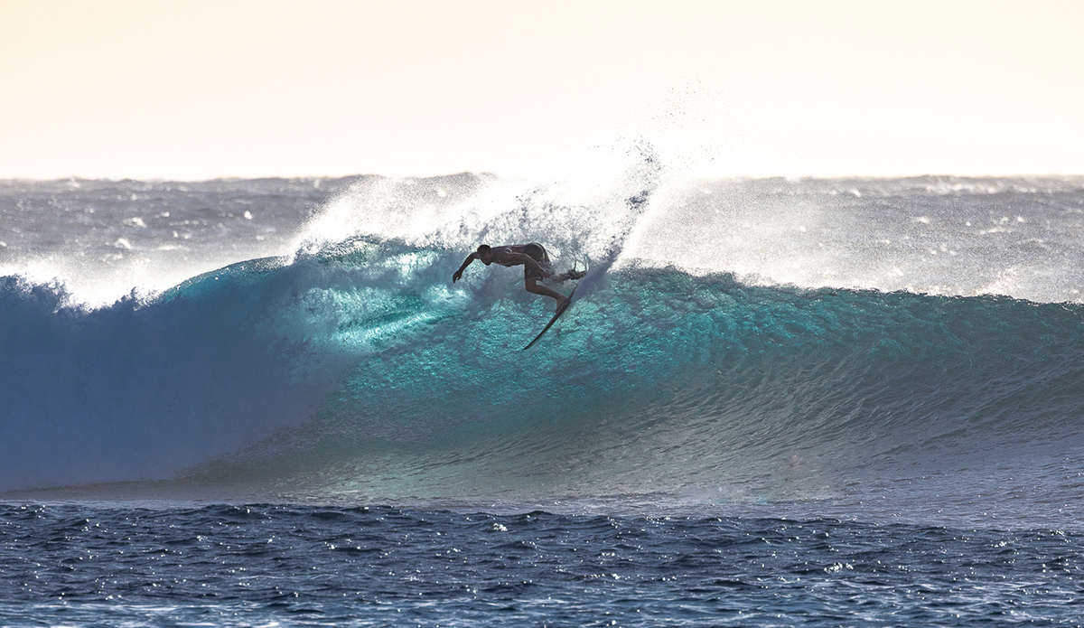 Laury Le Coustour surfing Saint-Leu, Reunion Island.
