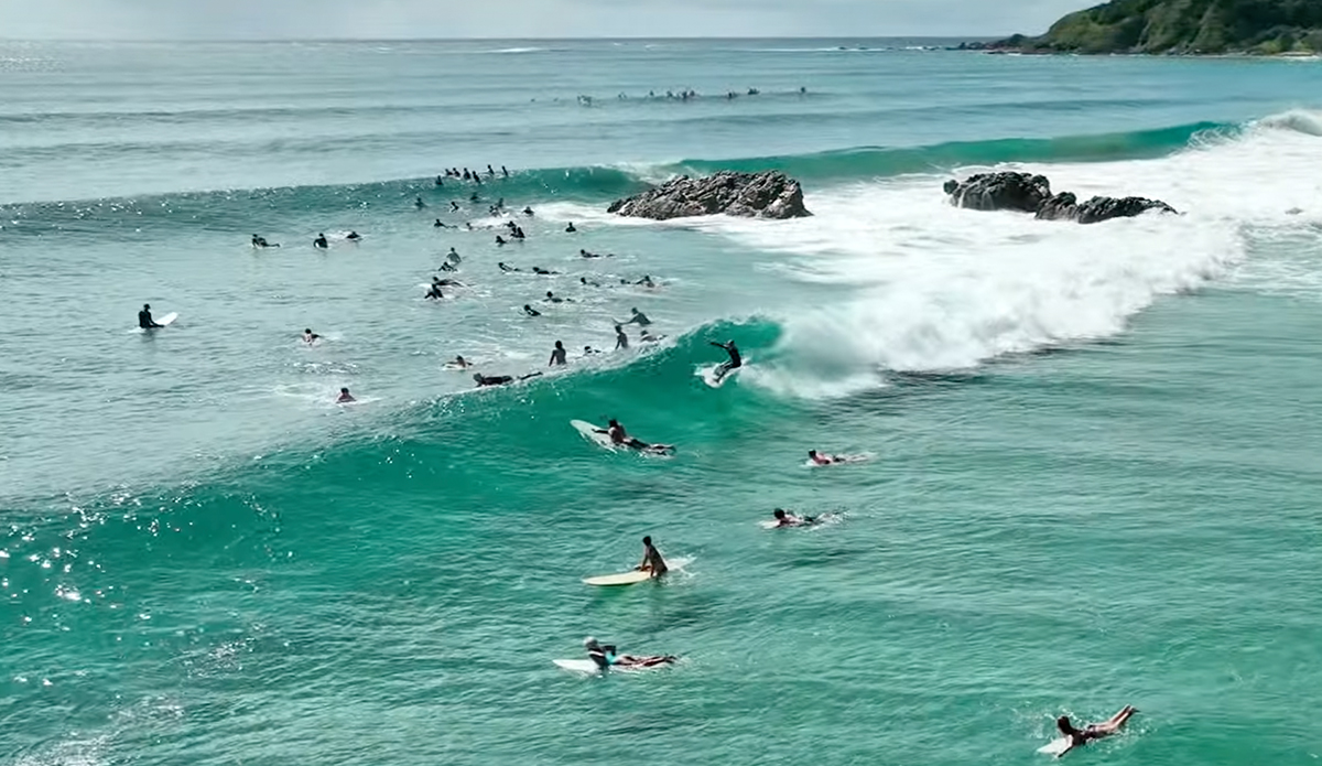 Surfers at Byron Bay.