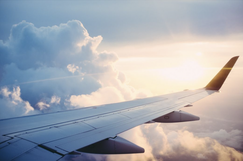 Airplane wing. Jet lag and travel.