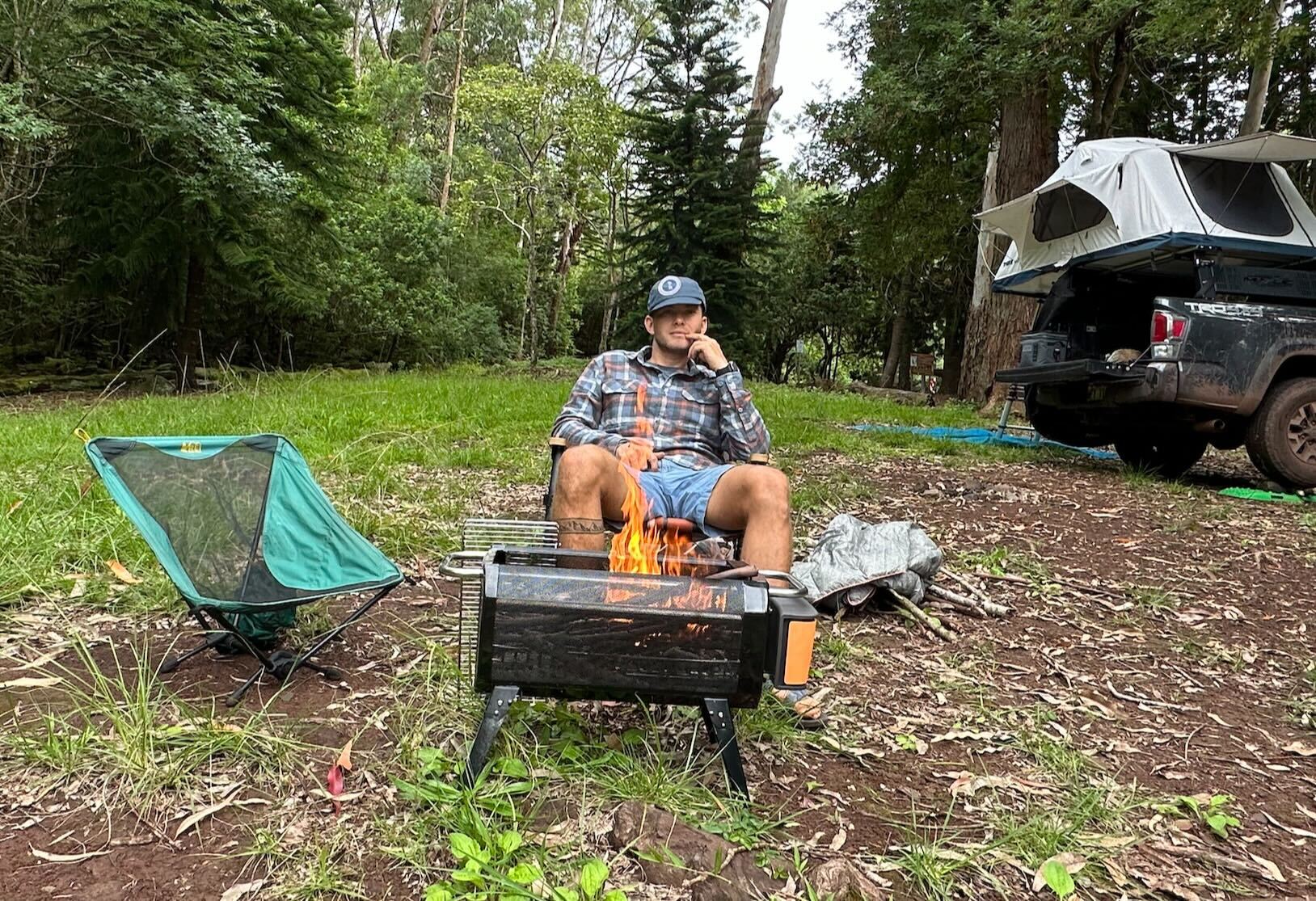 camping chairs by a fire